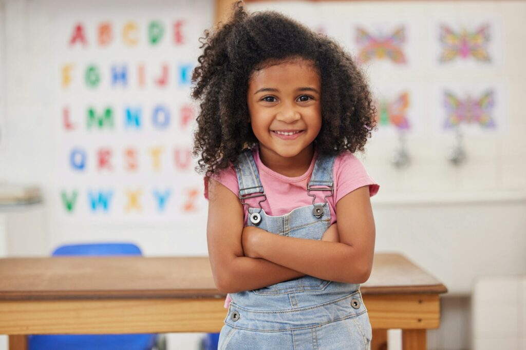 Preschool is fun. Shot of an adorable little girl in class.